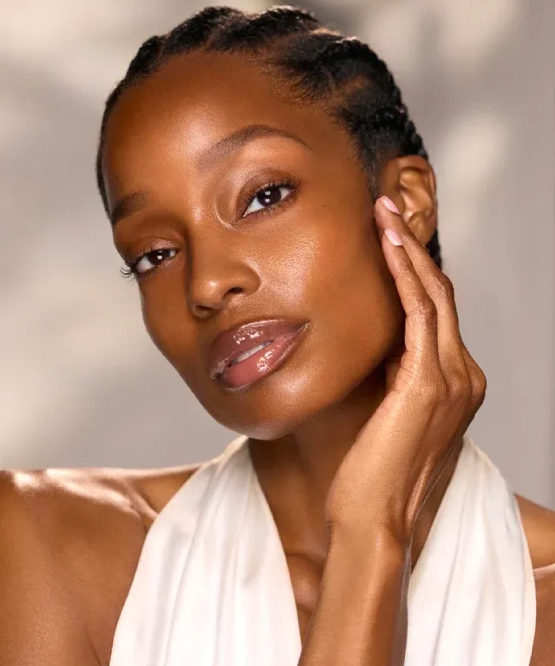 Woman with radiant, healthy-looking skin for Blissed Out Balancing Face Oil