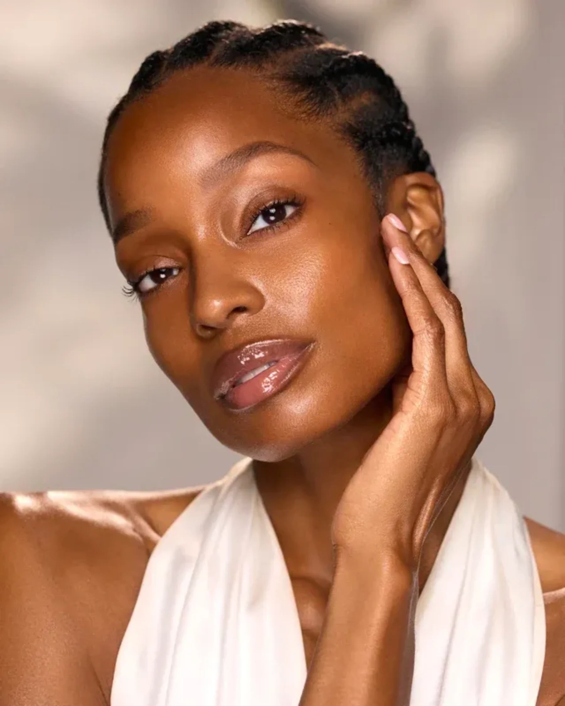 Woman with radiant, healthy-looking skin for Blissed Out Balancing Face Oil