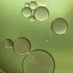 Botanical face oil droplets showing the lightweight texture of Céleste Switala grooming oil
