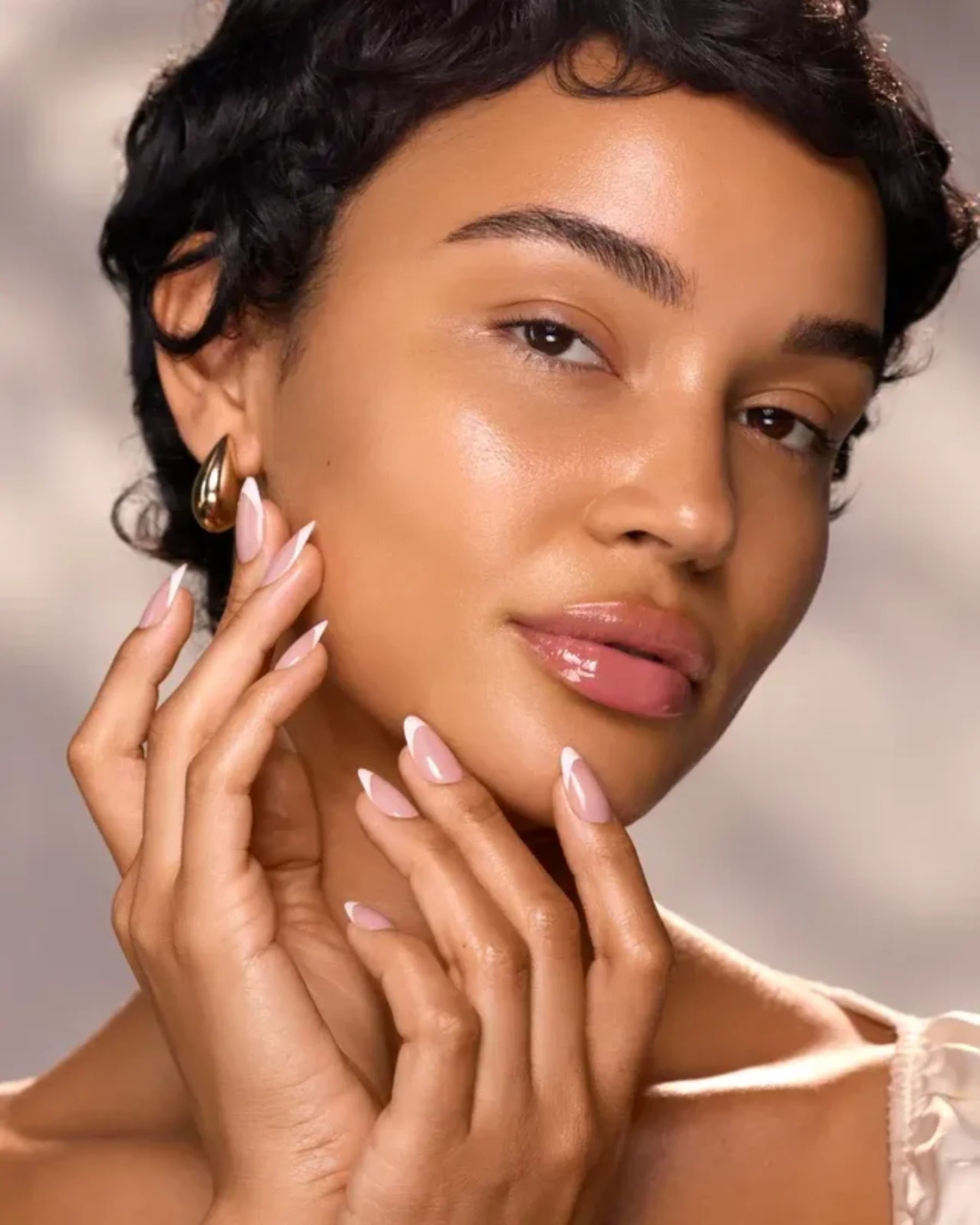 Close-up of model with luminous skin for High Vibe Clarifying Face Oil