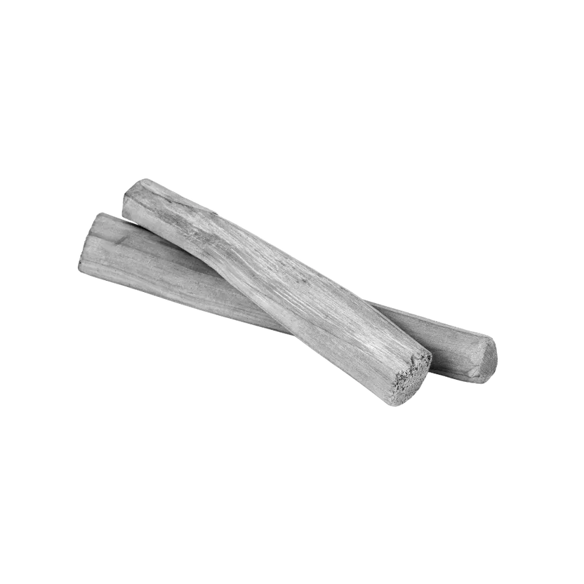 Black and white sandalwood sticks with a natural woody texture, representing sandalwood essential oil used in skincare.